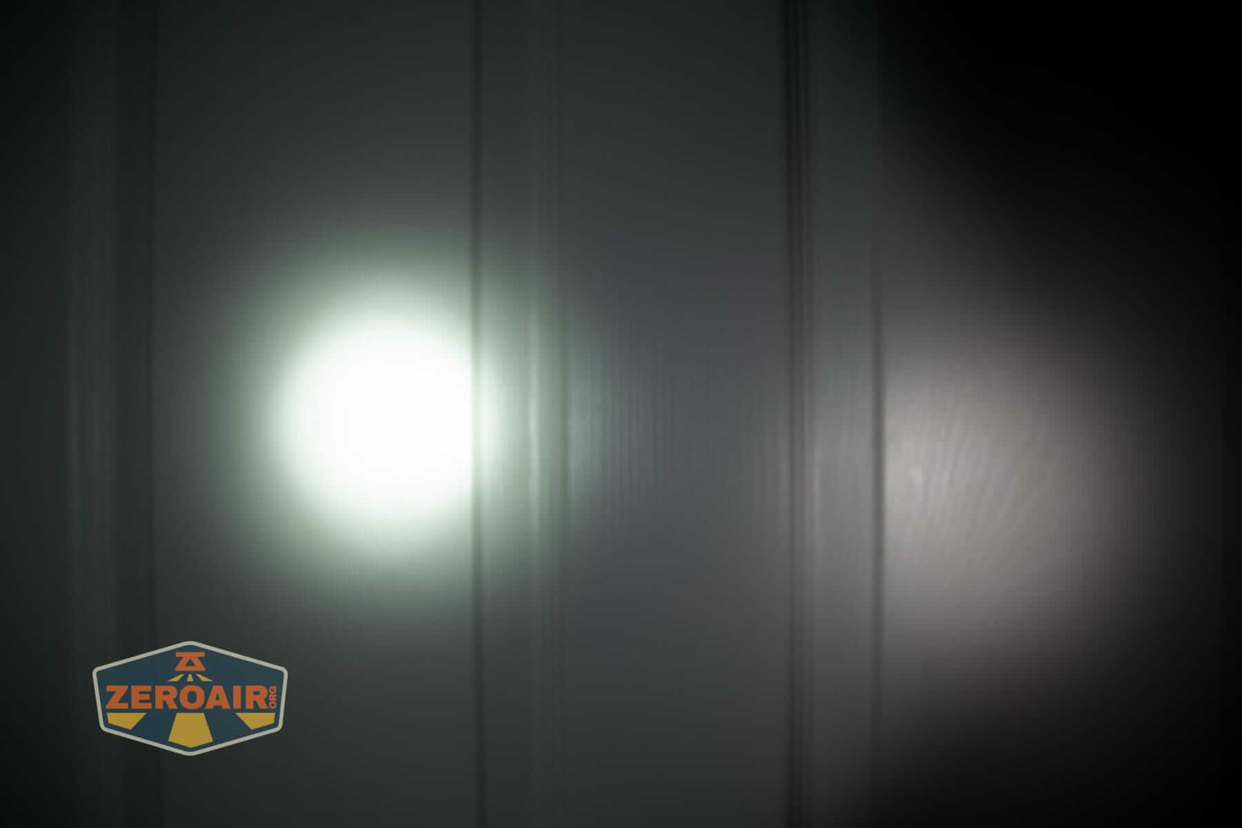 Wurkkos HD02 Pro flashlight beamshots on door (at 1') compared to nichia 219b 4500K