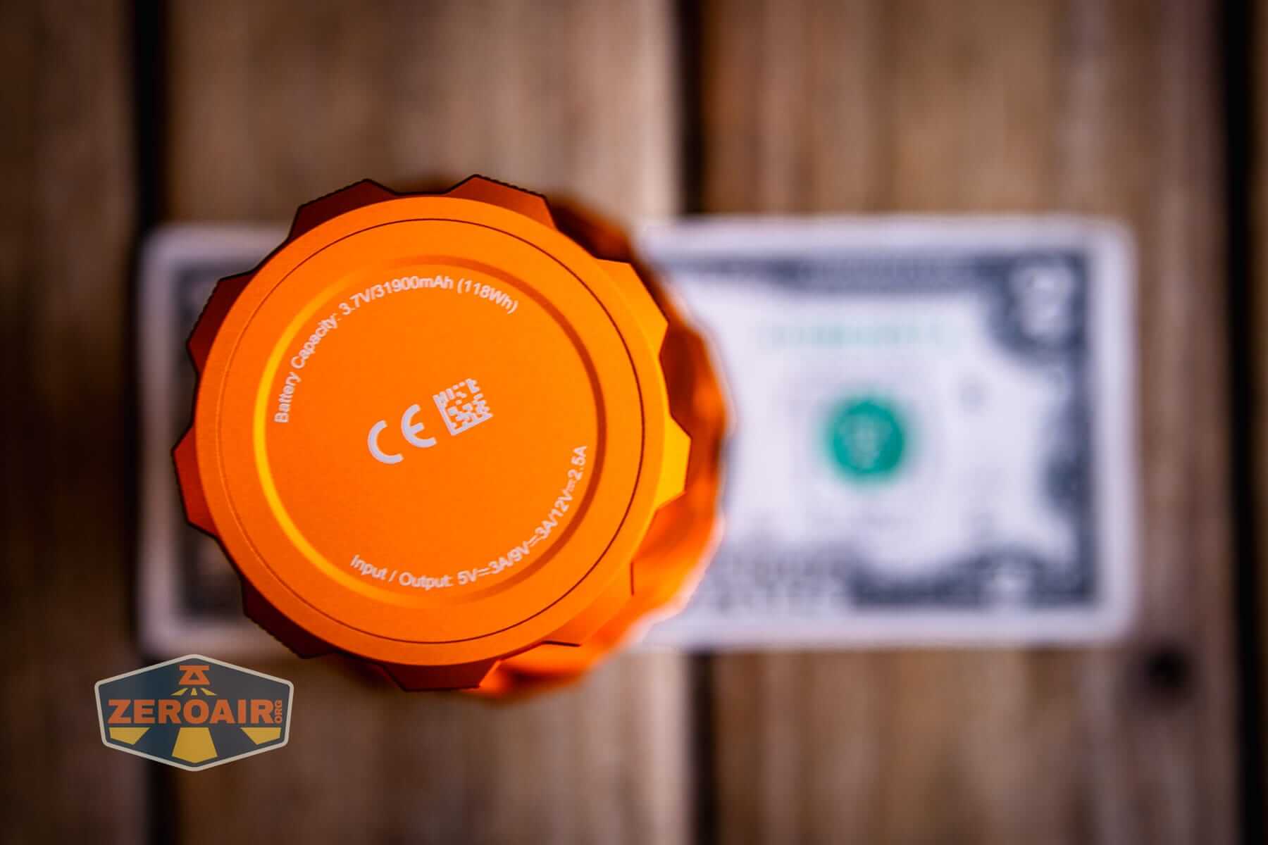 Olight Marauder 3 on two dollar bill