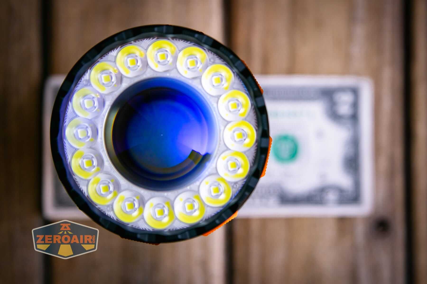 Olight Marauder 3 on two dollar bill
