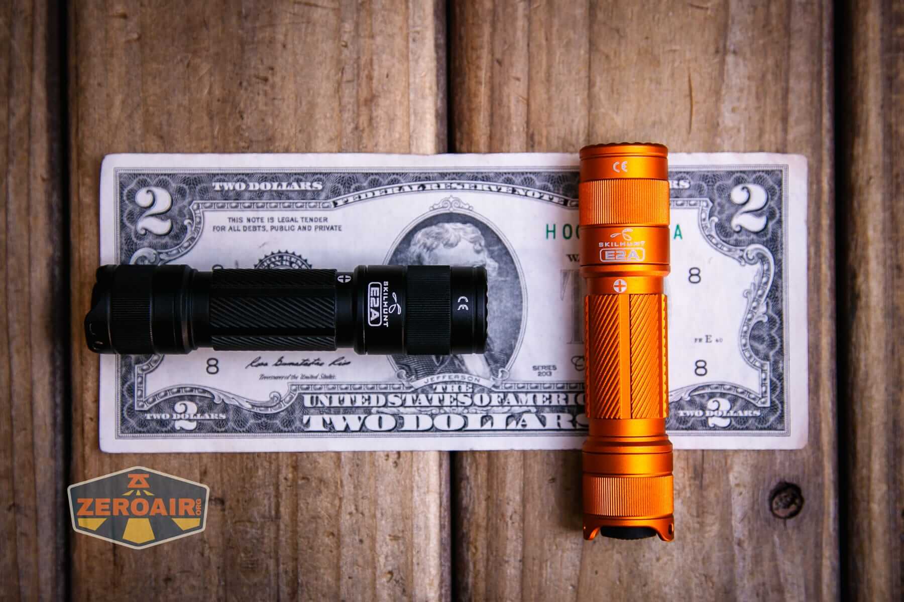 Skilhunt E2A V2 flashlight on a two dollar bill