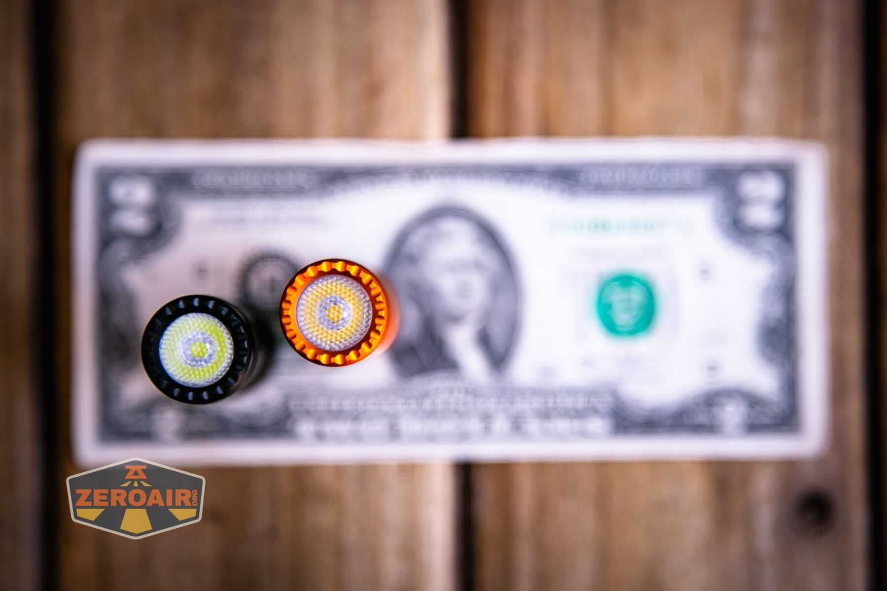 Skilhunt E2A V2 flashlight on a two dollar bill