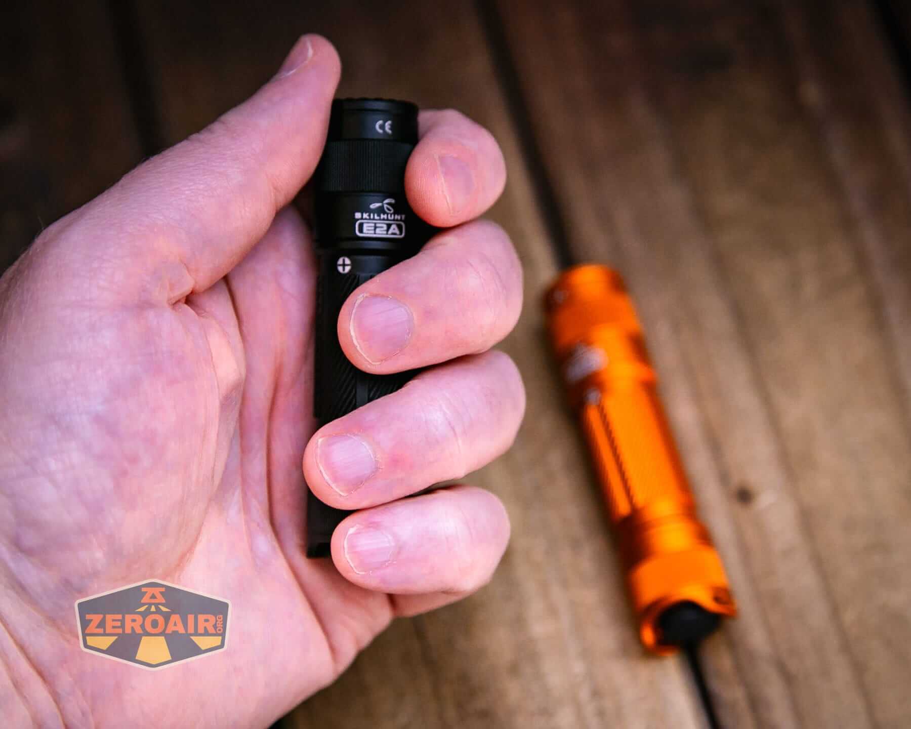 Skilhunt E2A V2 flashlight in hand