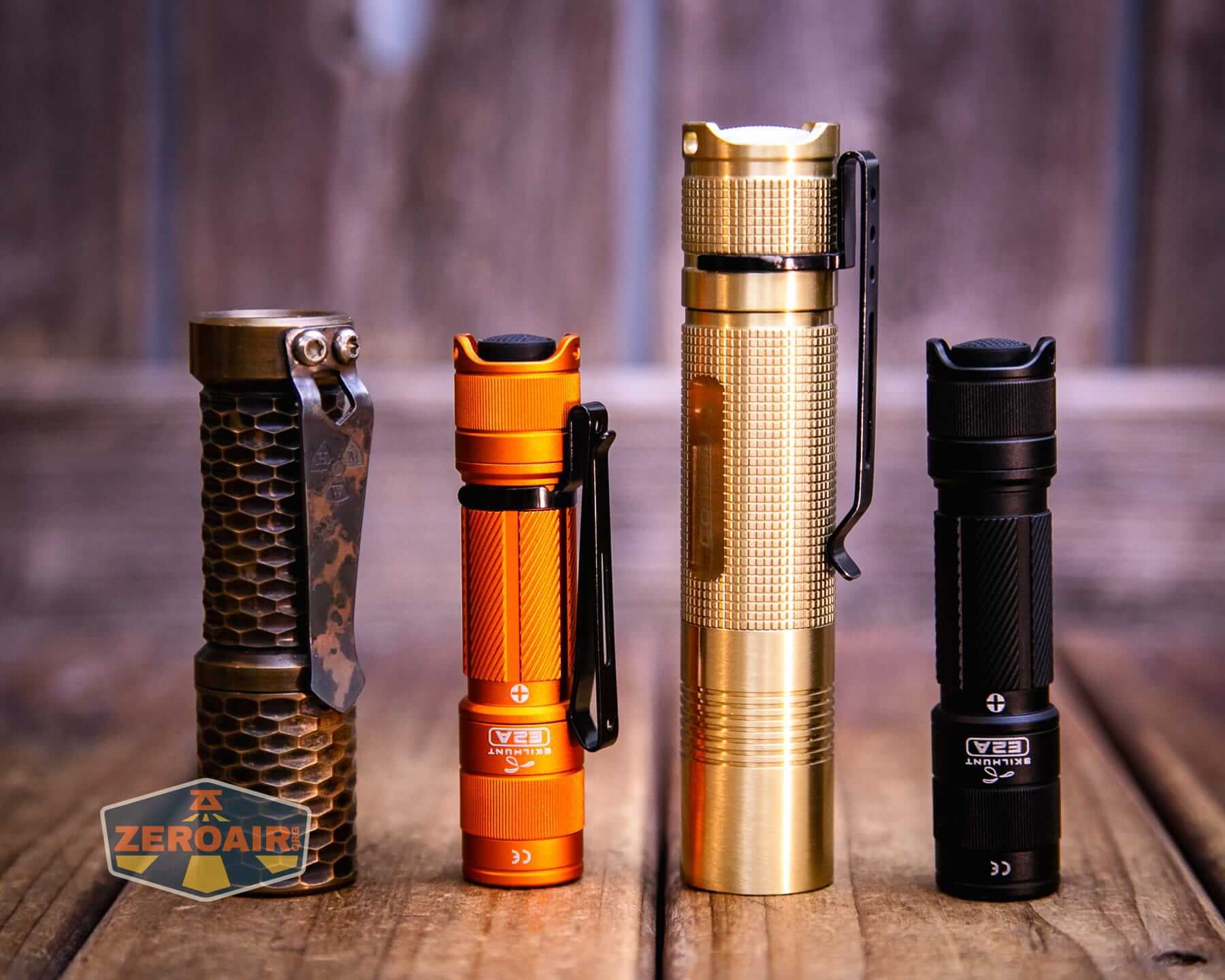 Skilhunt E2A V2 flashlight with two standard sized flashlights
