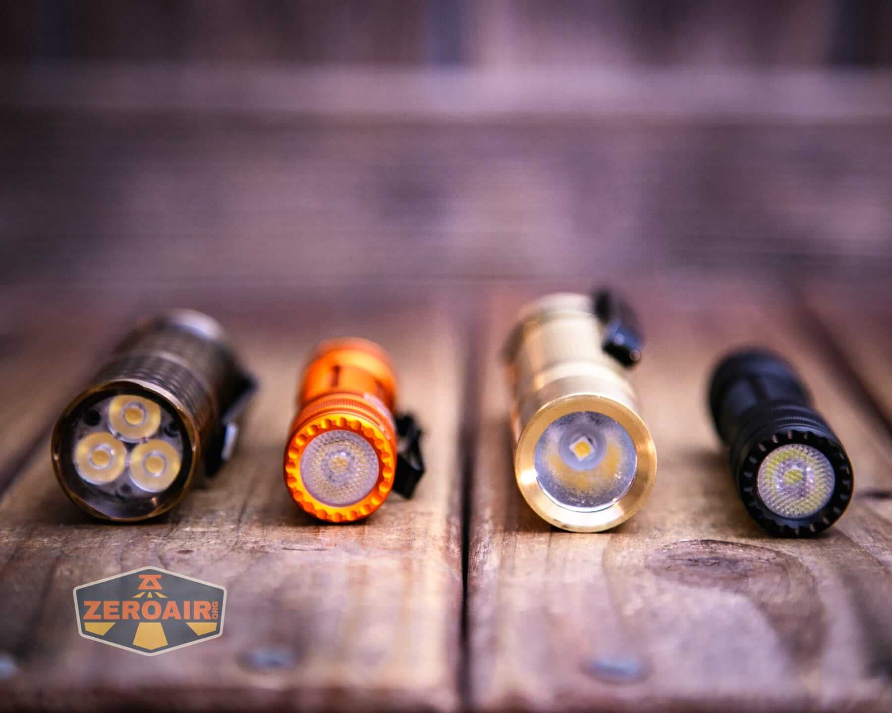 Skilhunt E2A V2 flashlight with two standard sized flashlights