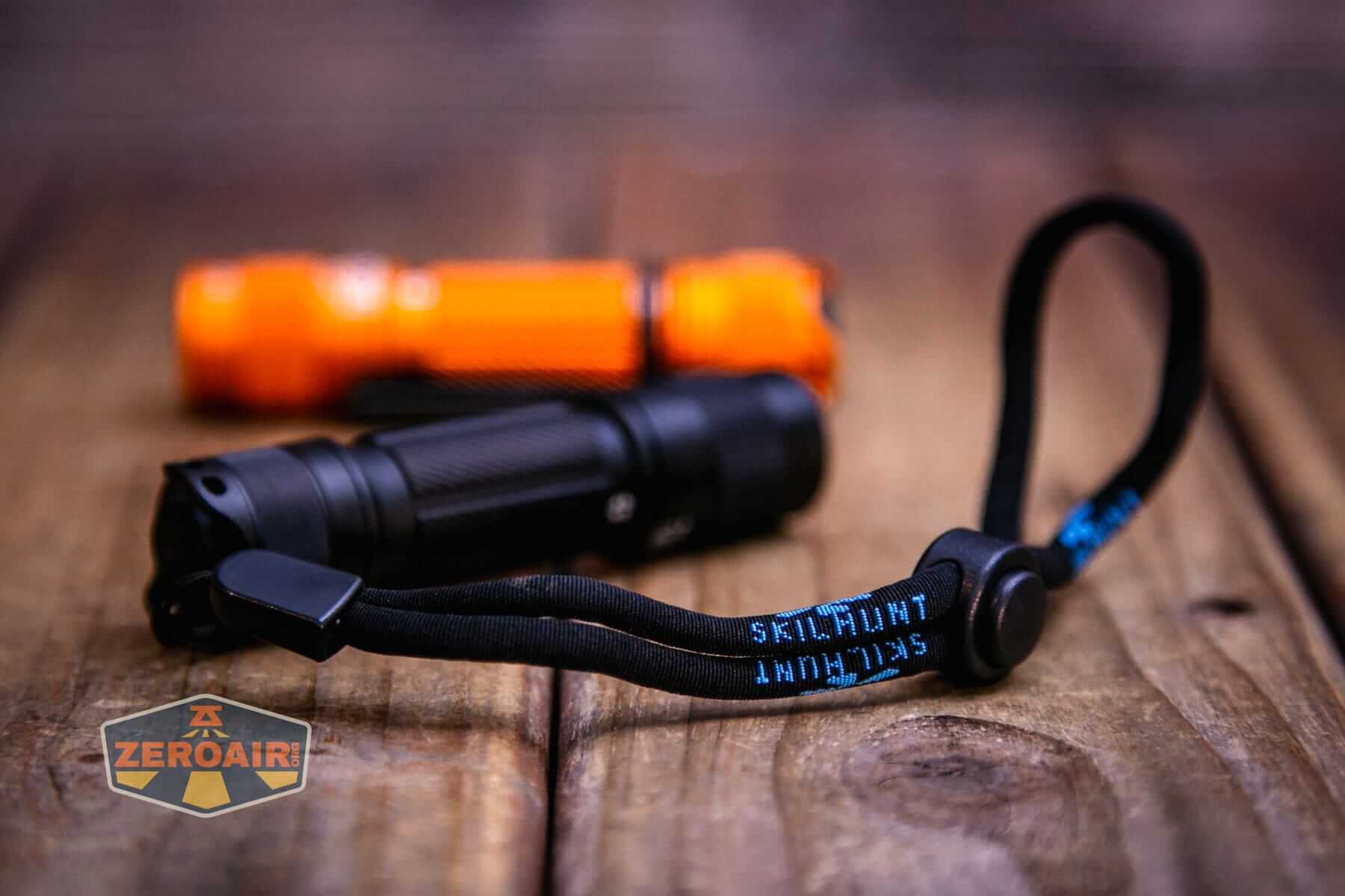 Skilhunt E2A V2 flashlight with lanyard installed