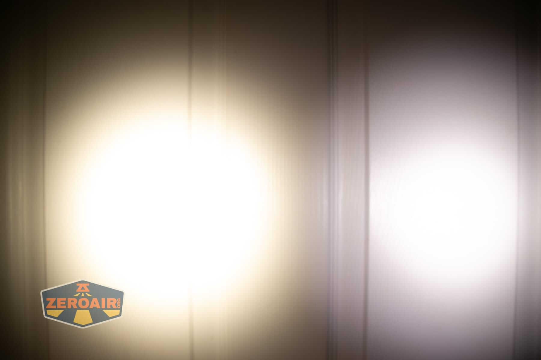 Skilhunt E2A V2 flashlight beamshots on door (at 1') compared to nichia 219b 4500K