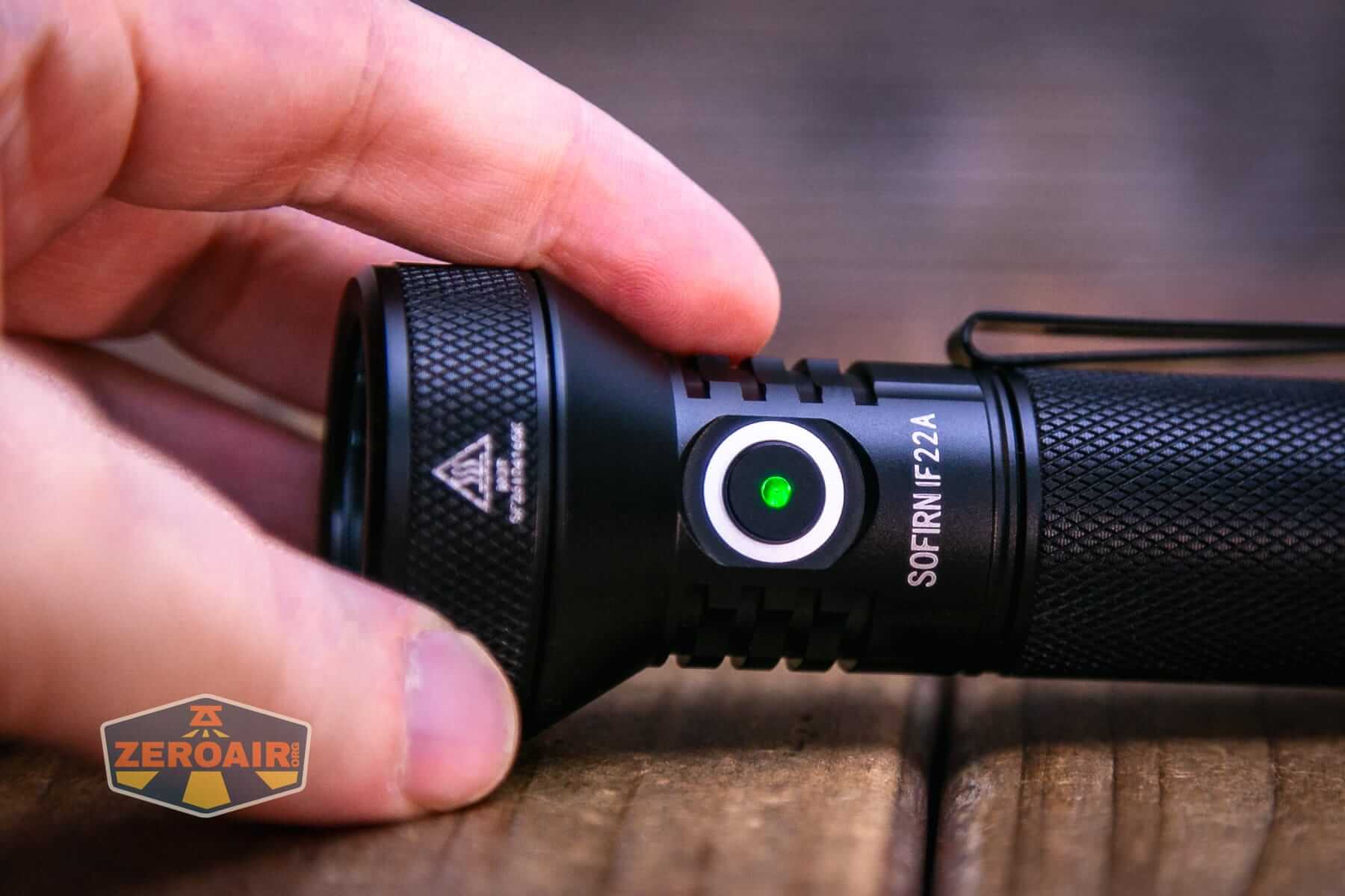 Sofirn IF22A thrower flashlight e-switch lit in green