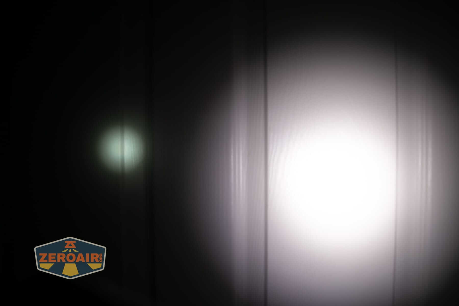 Sofirn IF22A thrower flashlight beamshots on door (at 1') compared to nichia 219b 4500K