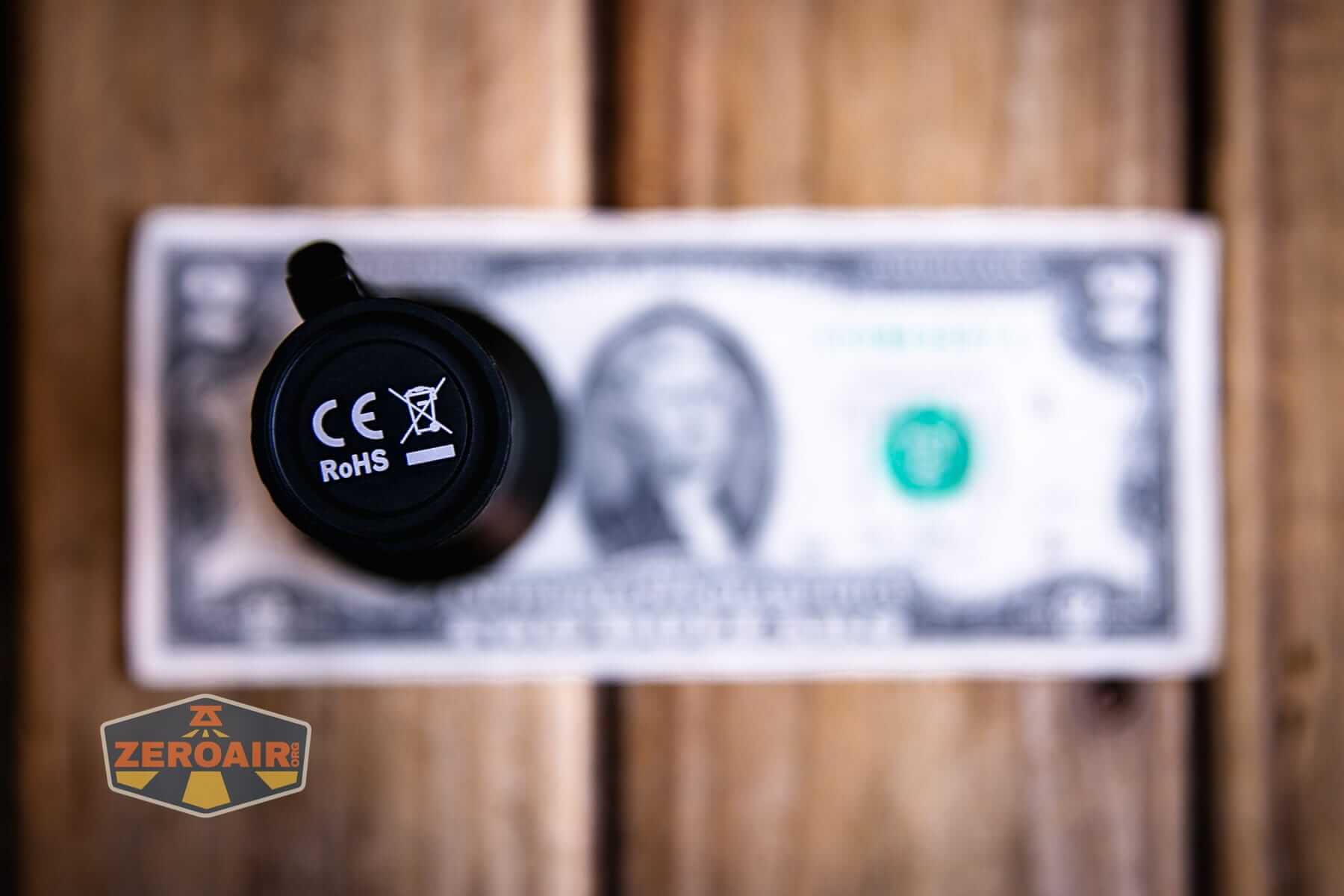 Sofirn IF22A V2 flashlight on a two dollar bill