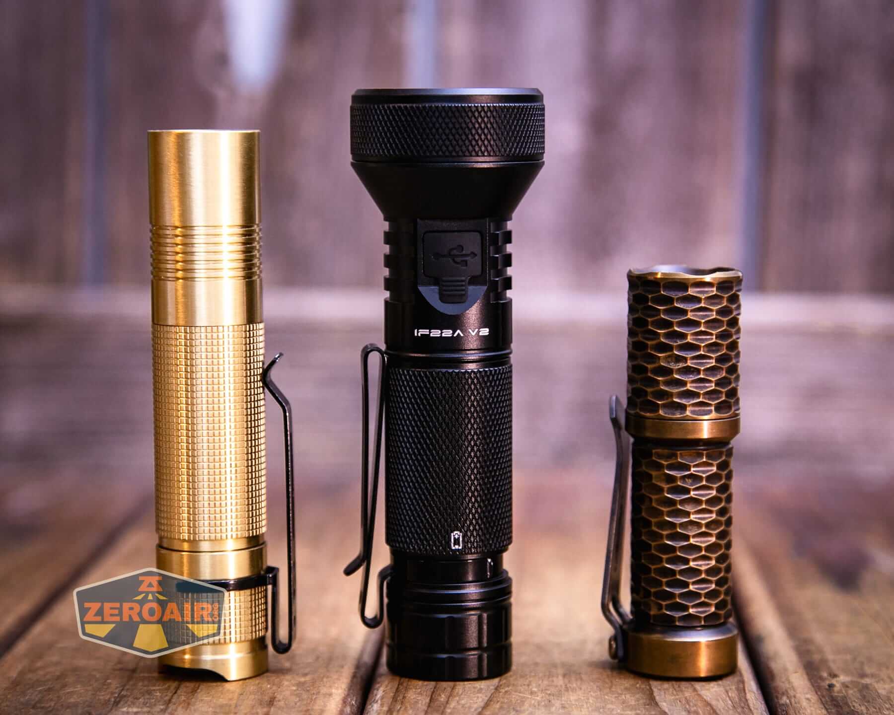 Sofirn IF22A V2 flashlight with two standard sized flashlights
