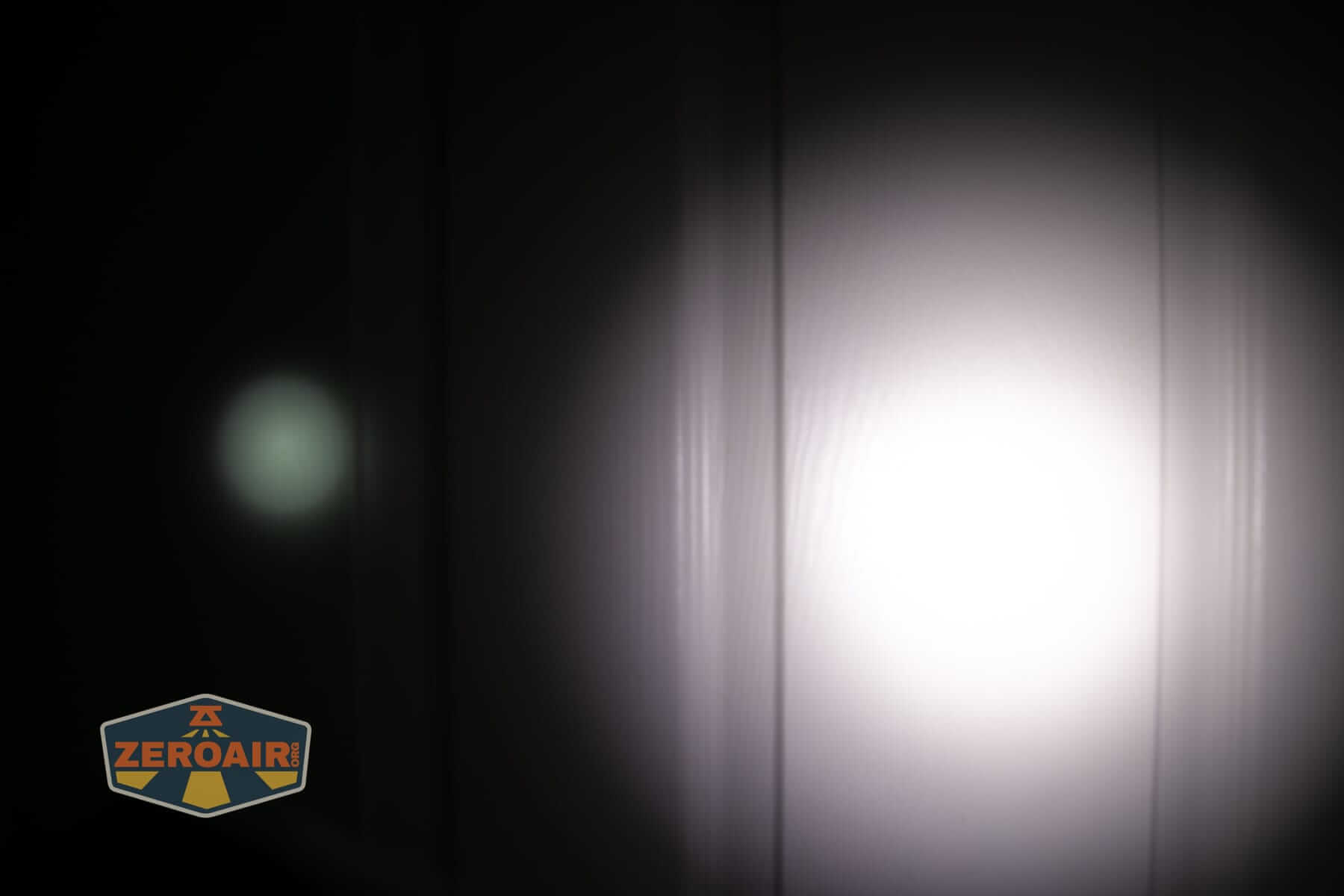 Sofirn IF22A V2 flashlight beamshots on door (at 1') compared to nichia 219b 4500K