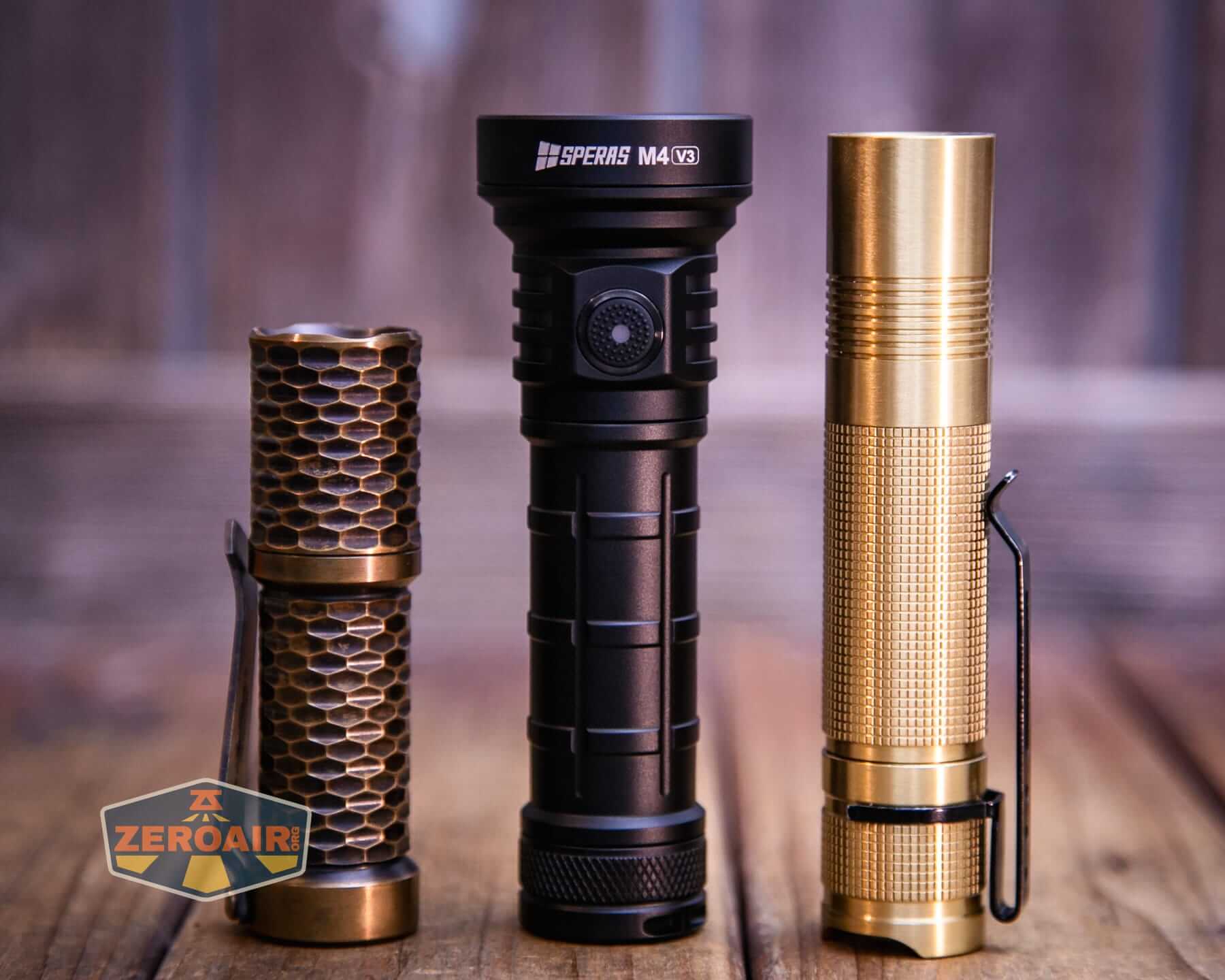 Speras M4 V3 compact EDC flashlight with two standard sized flashlights