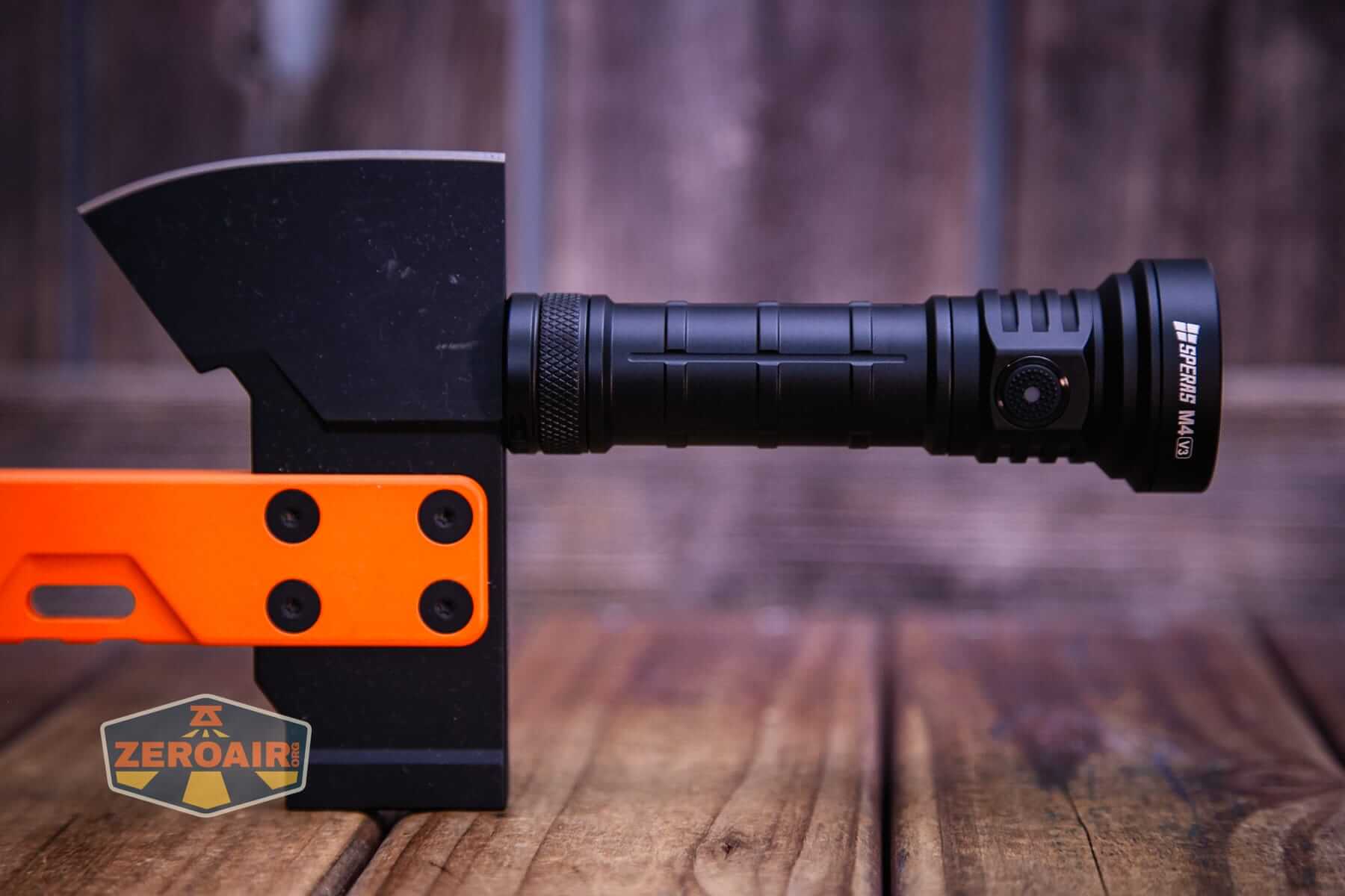Speras M4 V3 compact EDC flashlight magnet in use