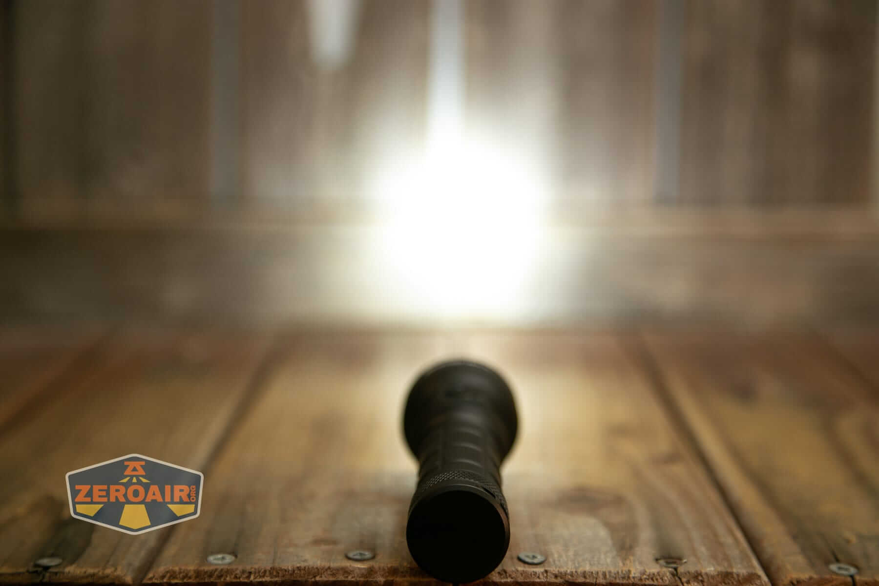 Speras M4 V3 compact EDC flashlight emitter on
