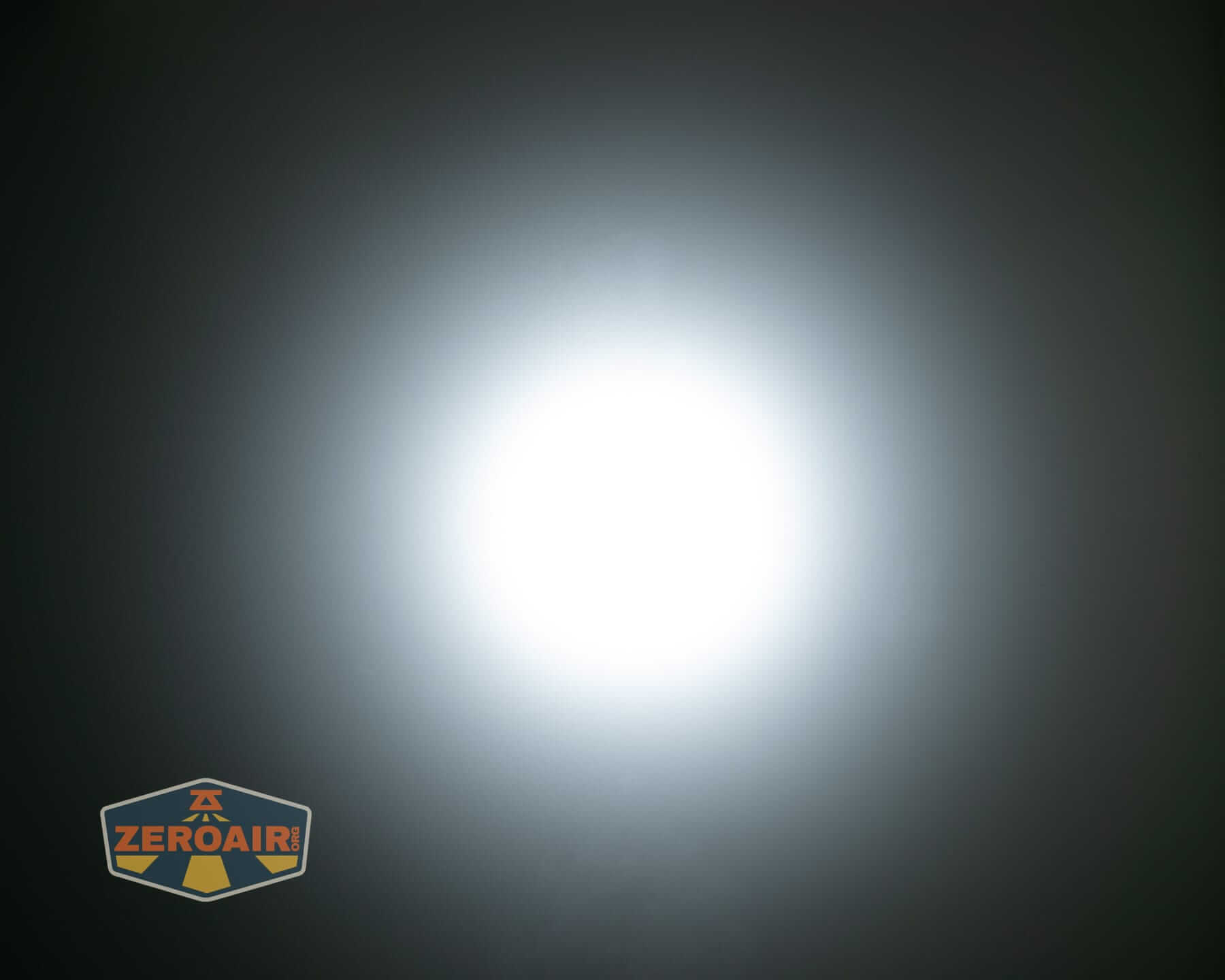 Speras M4 V3 compact EDC flashlight beamshots on ceiling