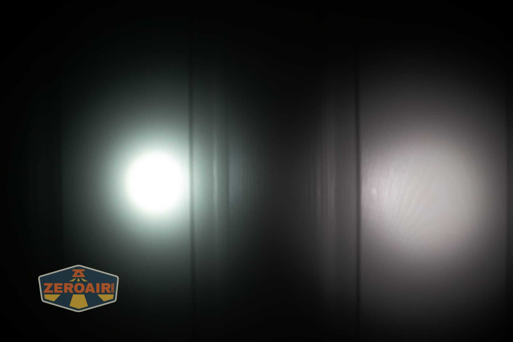 Speras M4 V3 compact EDC flashlight beamshots on door (at 1') compared to nichia 219b 4500K