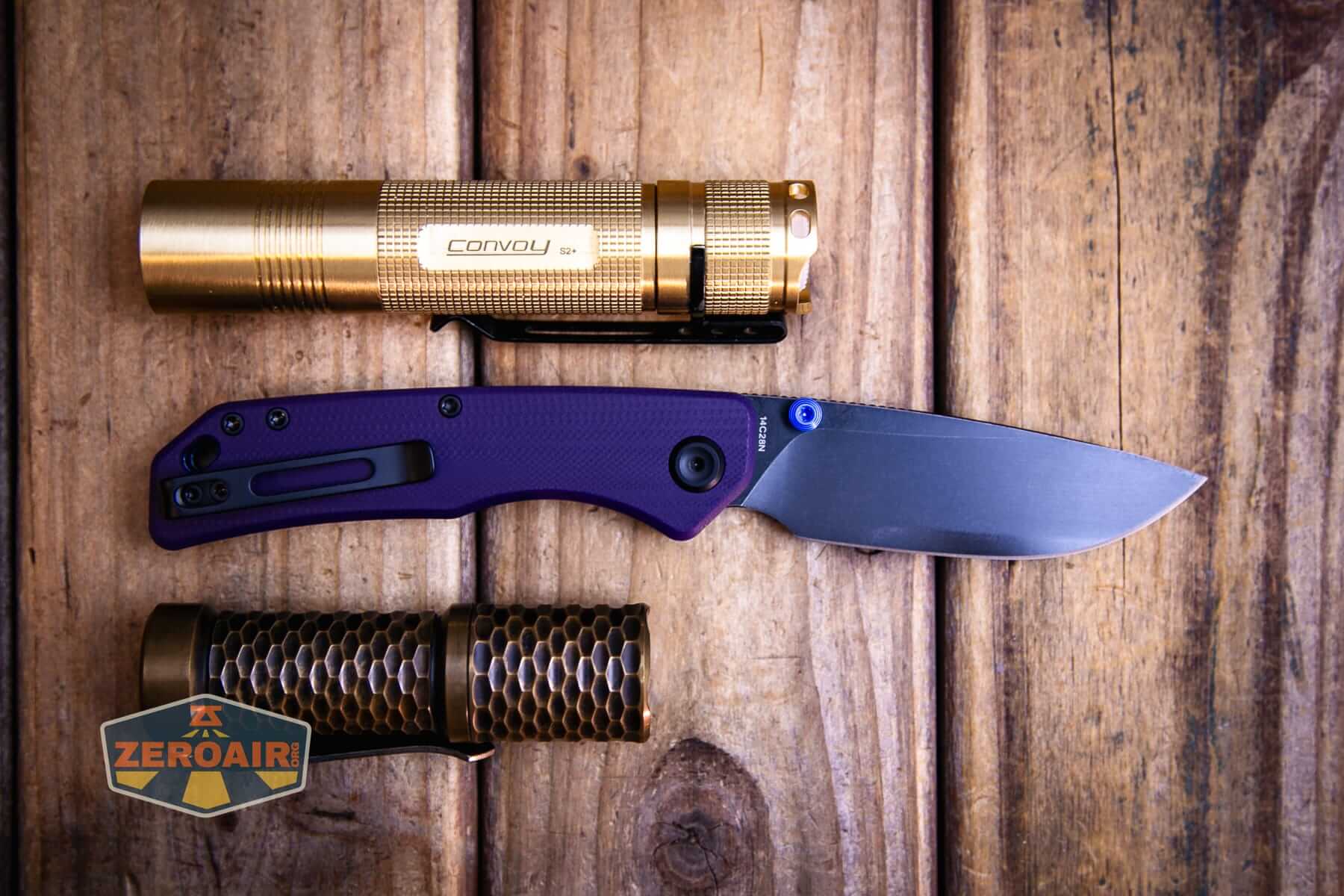 Vosteed Marten 330 Purple knife with two standard-sized flashlights