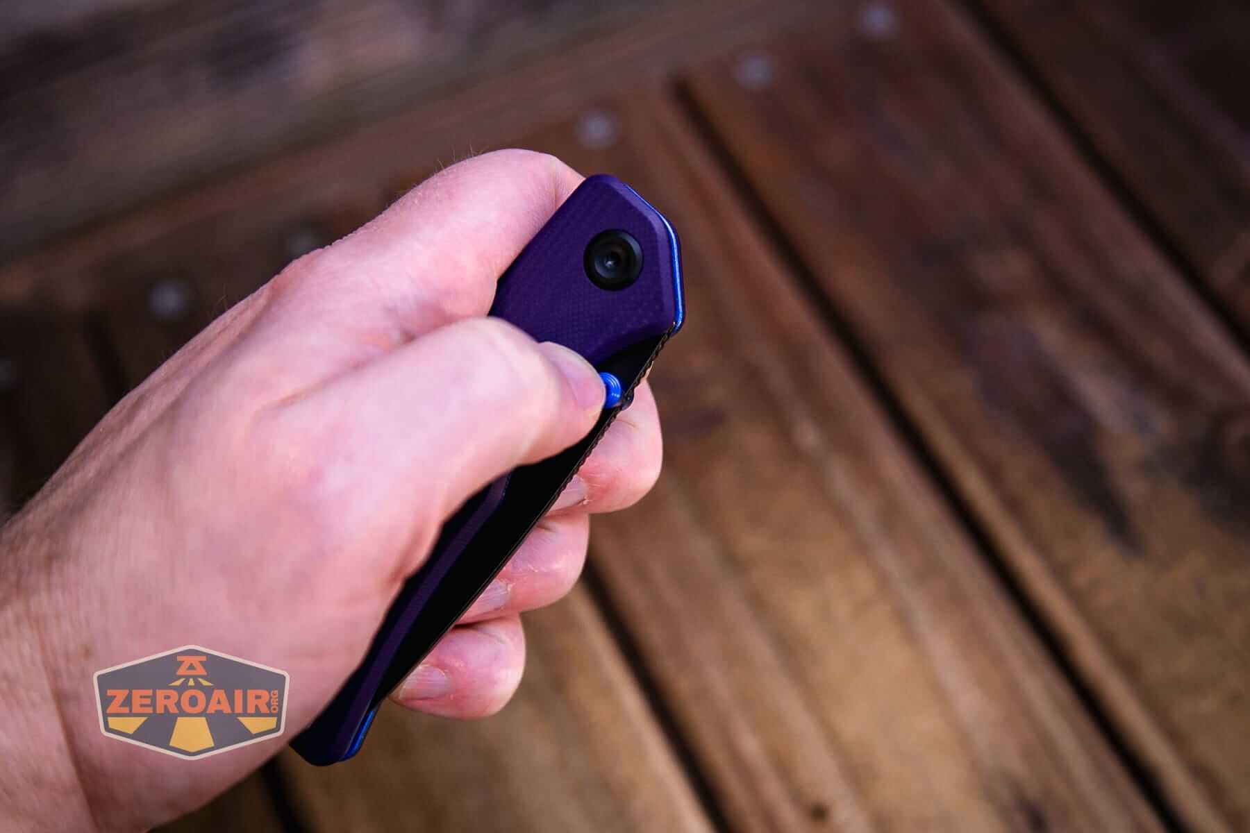 Vosteed Marten 330 Purple knife in hand