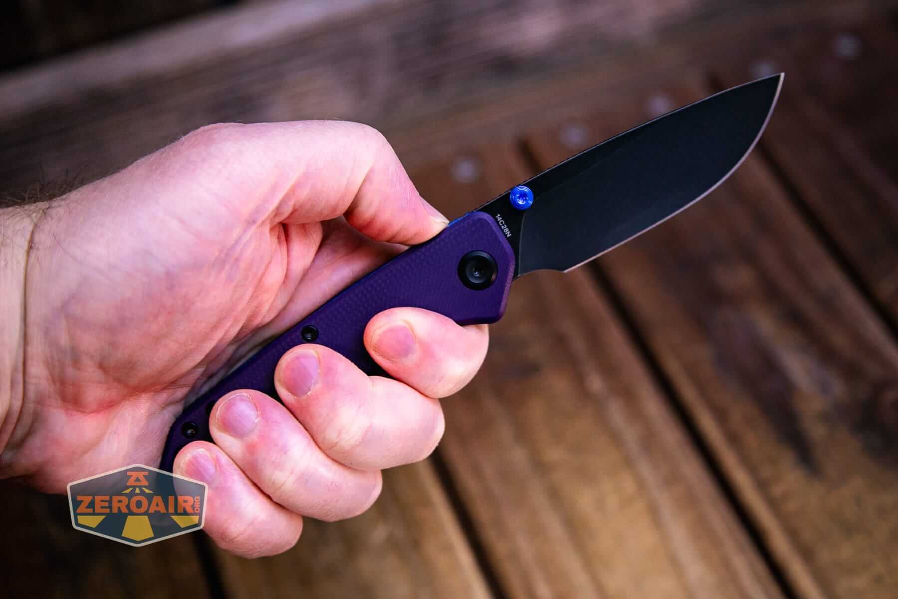 Vosteed Marten 330 Purple knife open in hand