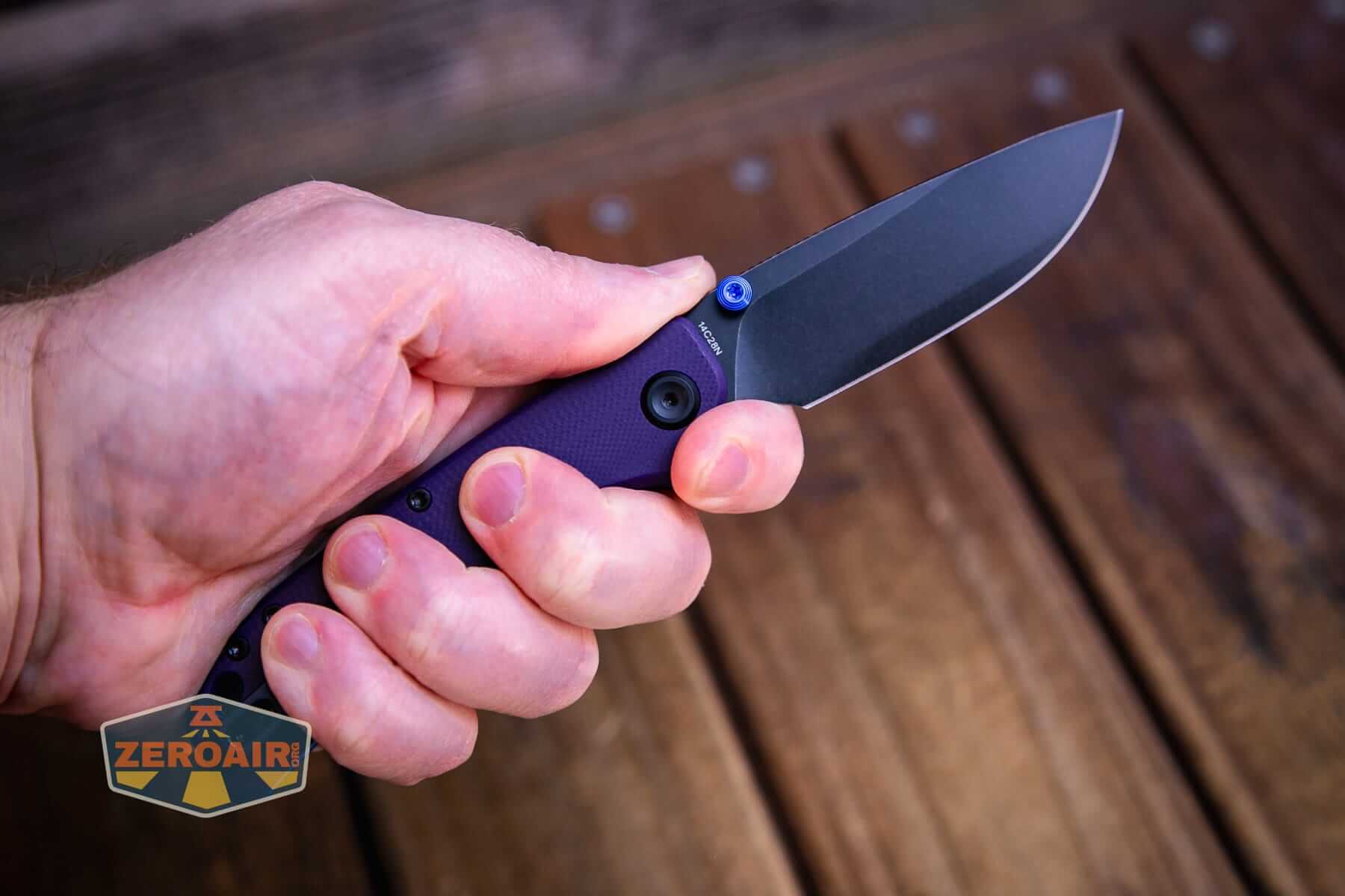 Vosteed Marten 330 Purple knife open in hand