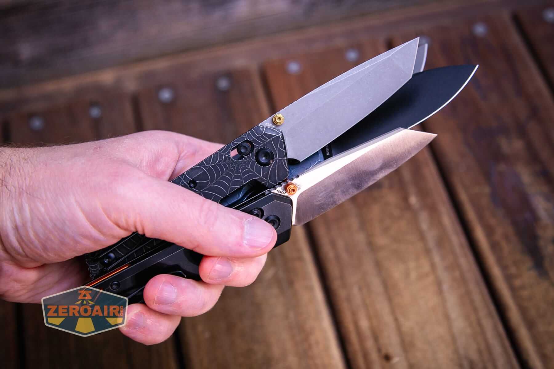 Vosteed Raccoon TiSlim knife with other slims in hand